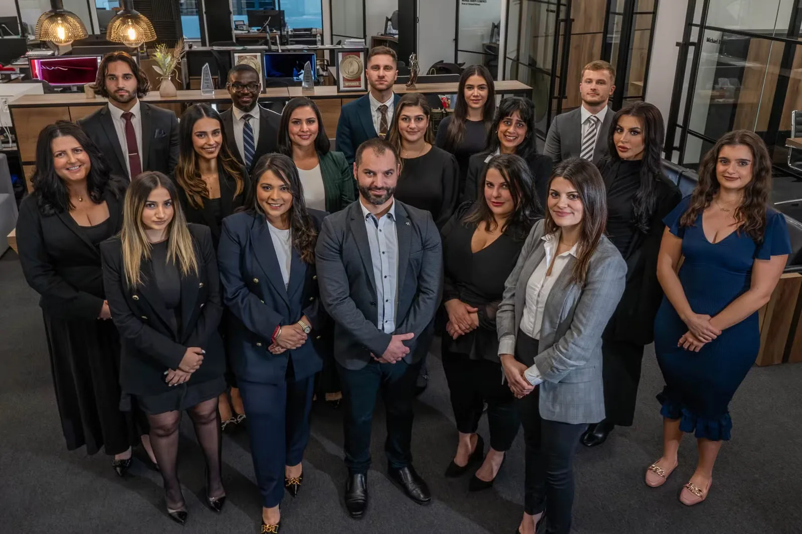 The Jameson Law team in their office.